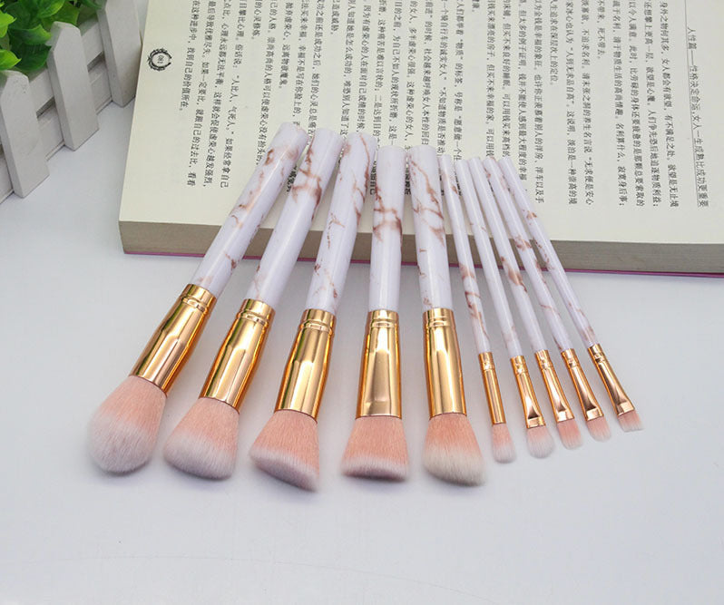 Highlighter brush with rose gold ferrule