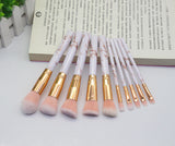 Highlighter brush with rose gold ferrule