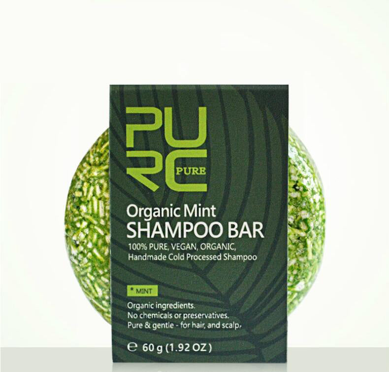 Lather from shampoo bar on scalp