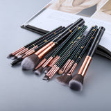 15 marbled makeup brushes laid flat