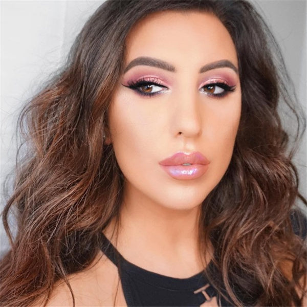 Model wearing polarized lip gloss outdoors