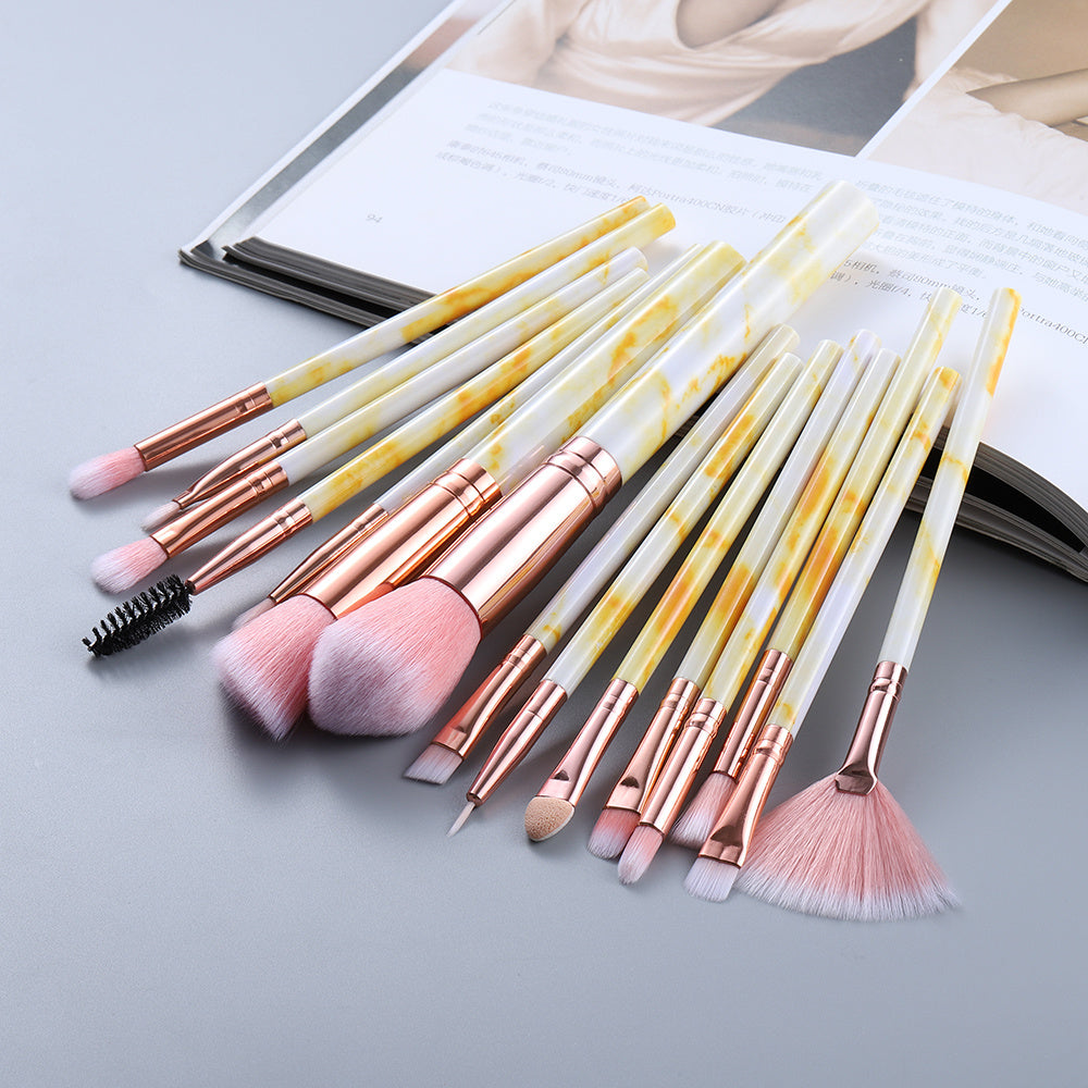 Highlighter brush with rose gold ferrule