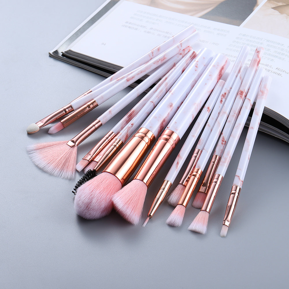 Highlighter brush with rose gold ferrule