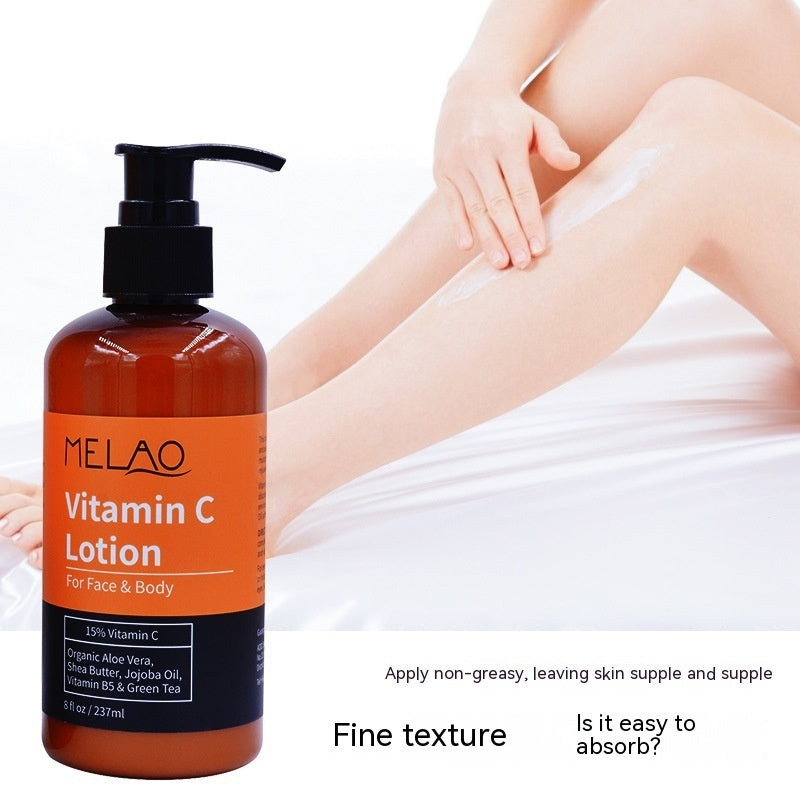 Woman applying Vitamin C body lotion