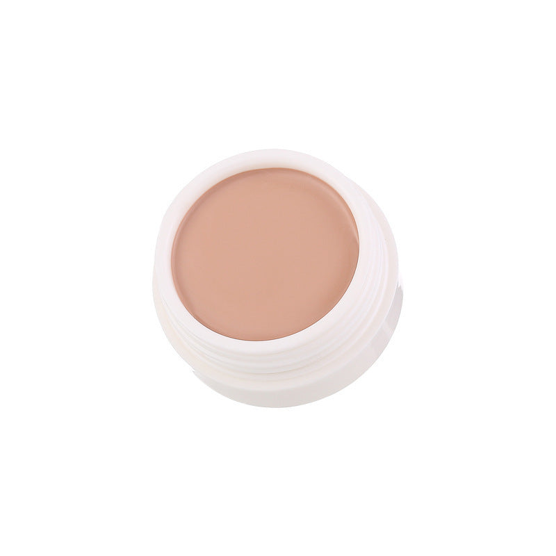 Concealer tube on white background